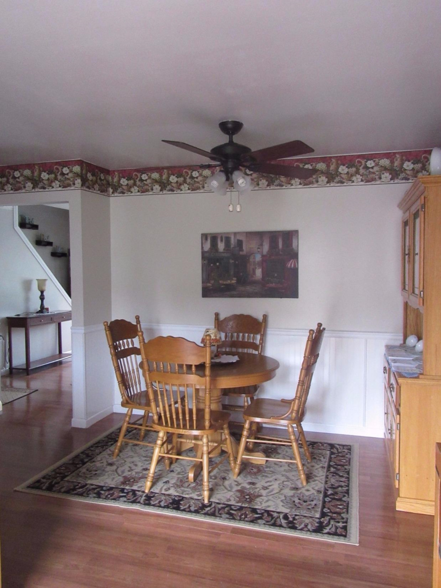 755-1 Governor Road Valparaiso, IN 46385 - Photo 9 of 10 a view of a dining room with furniture and wooden floor