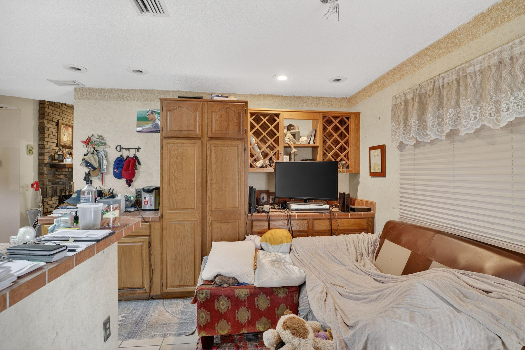 3133 Fairview Drive Melbourne, FL 32934 - Photo 16 of 45 a living room with furniture and a flat screen tv