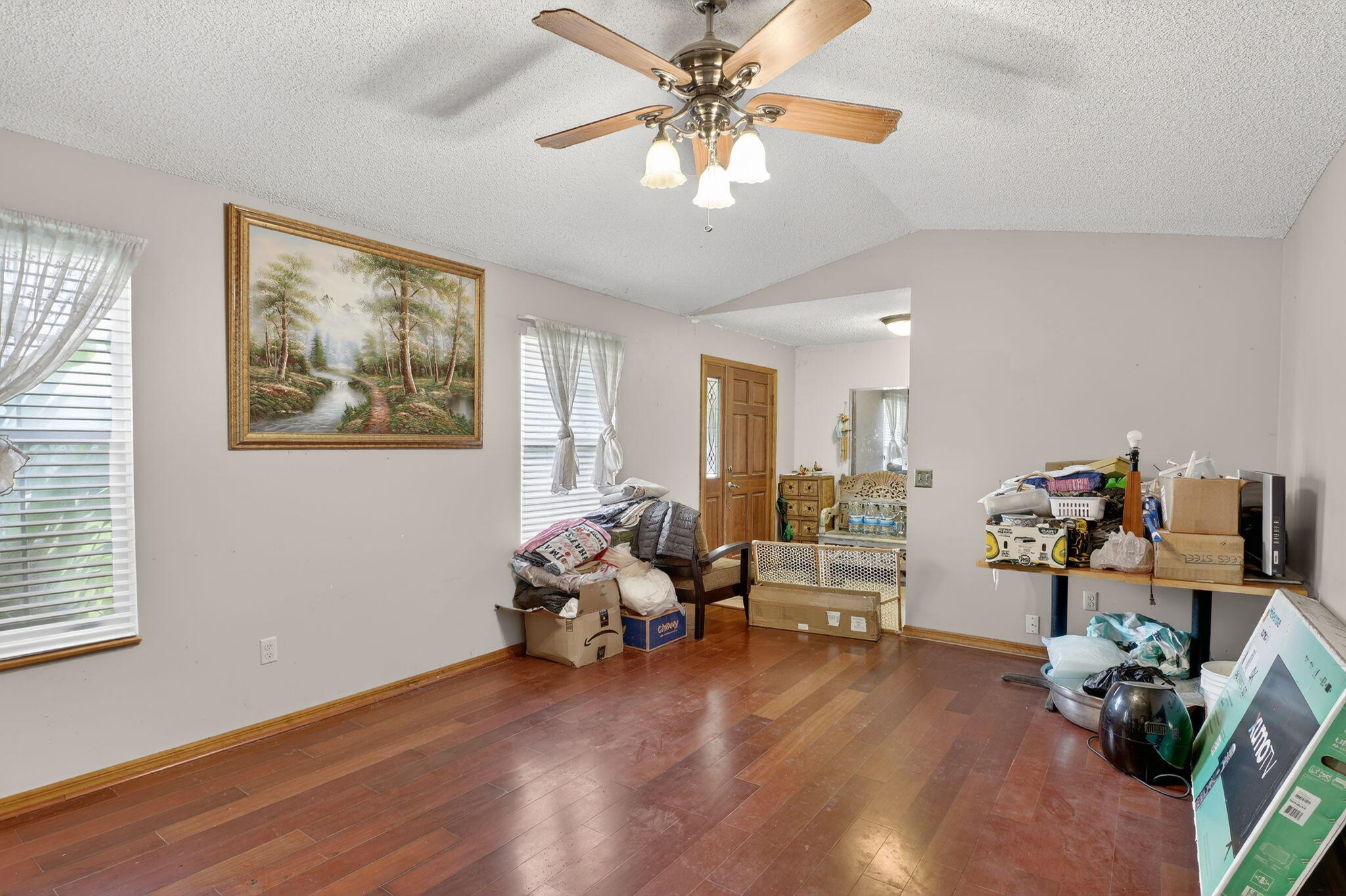 3133 Fairview Drive Melbourne, FL 32934 - Photo 9 of 45 a living room with furniture and wooden floor