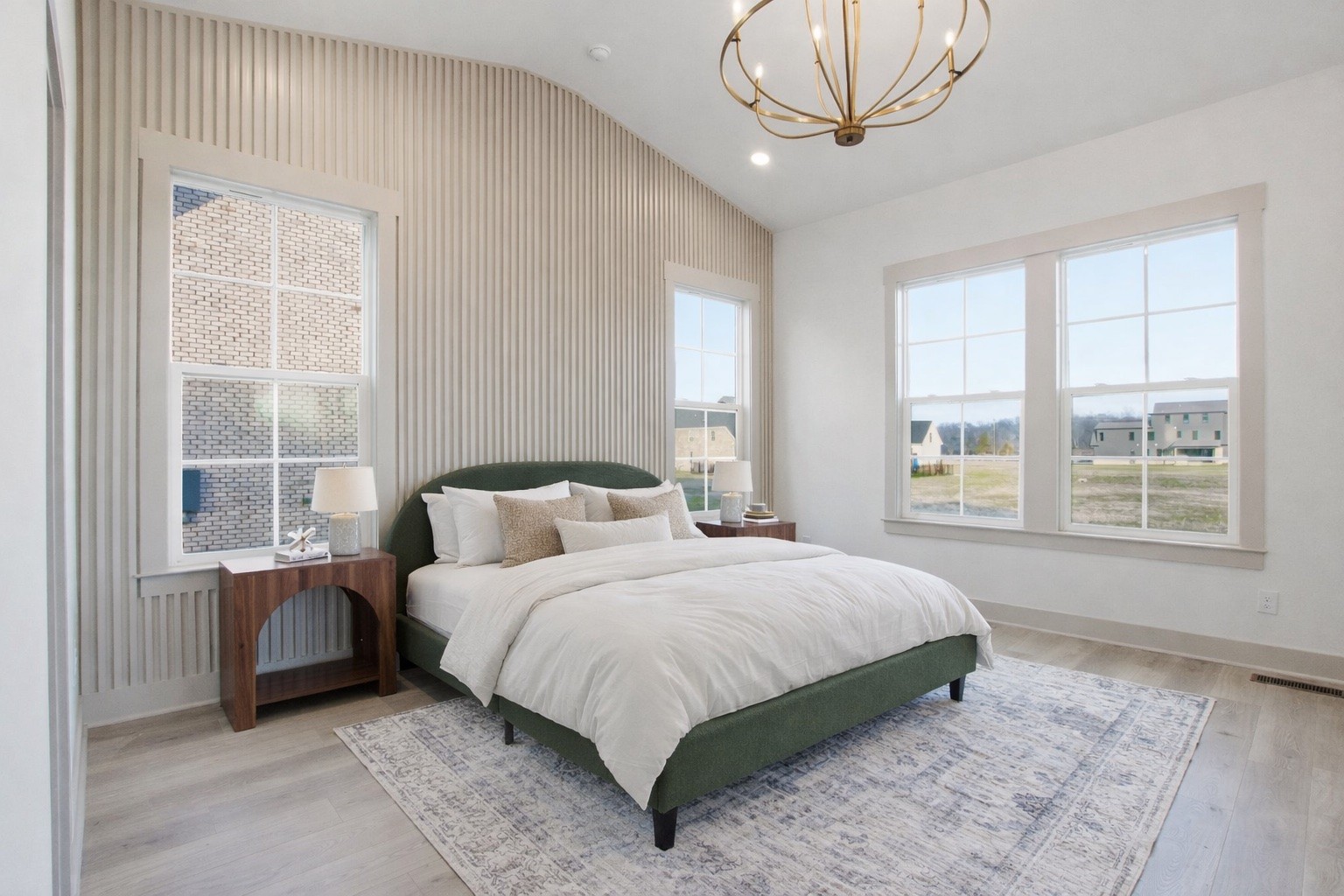 5509 East Overall Creek Road Rockvale, TN 37153 - Photo 15 of 36 a spacious bedroom with a bed a chandelier and a large window