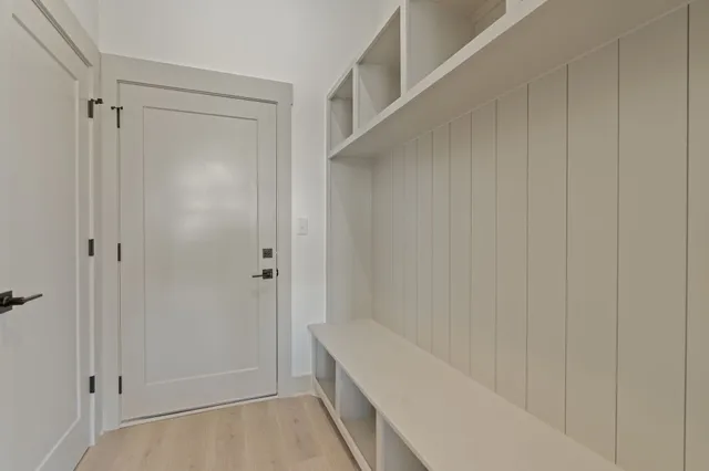 a bathroom with a tub and shower