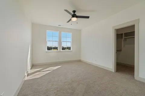 a bathroom with a double vanity sink and mirror