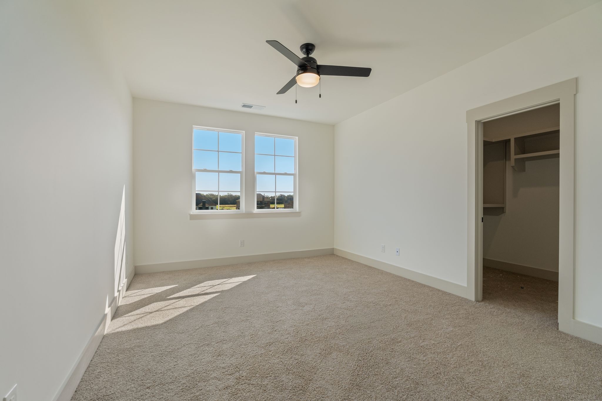 5509 East Overall Creek Road Rockvale, TN 37153 - Photo 23 of 36 an empty room with ceiling fan and window