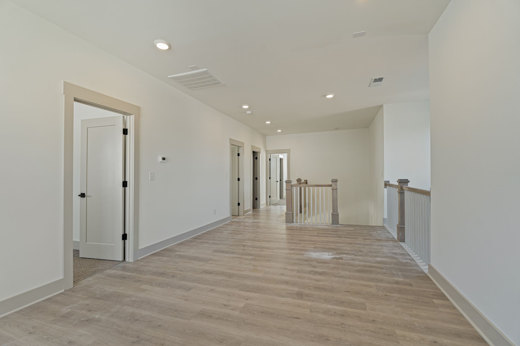 5509 East Overall Creek Road Rockvale, TN 37153 - Photo 32 of 36 a view of a hallway with wooden floor