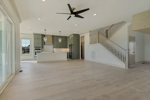 a view of a livingroom with a ceiling fan