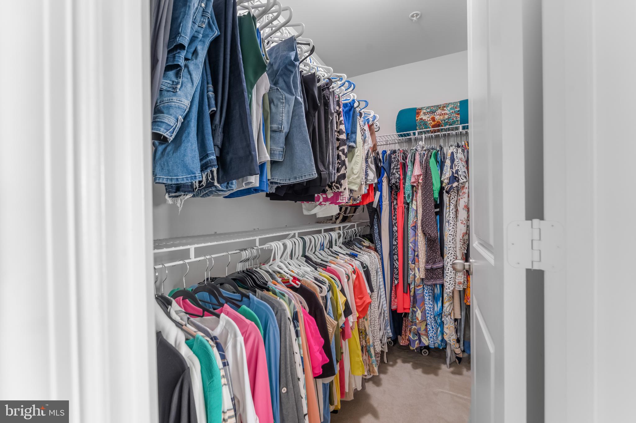 7820 Loblolly Way Hanover, MD 21076 - Photo 23 of 75 a view of walk in closet with clothes