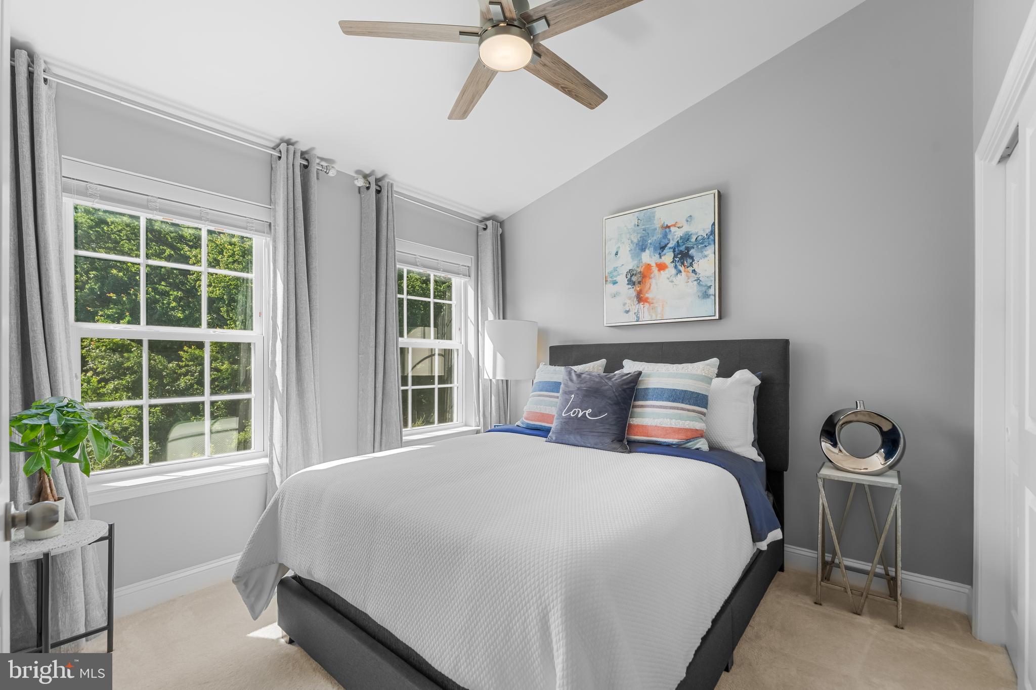 7820 Loblolly Way Hanover, MD 21076 - Photo 32 of 75 a bedroom with a large bed and a window