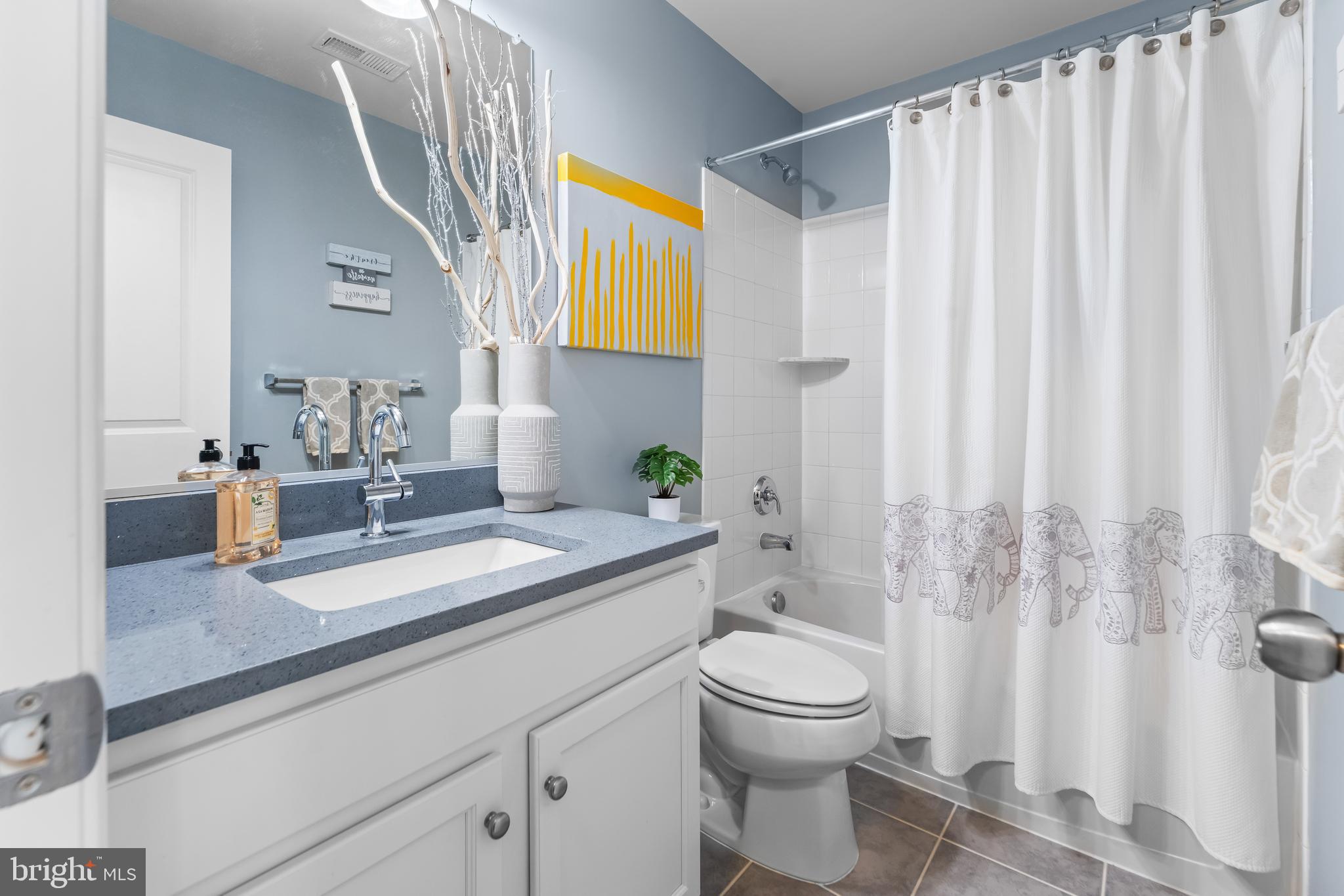 7820 Loblolly Way Hanover, MD 21076 - Photo 36 of 75 a bathroom with a granite countertop sink and a mirror
