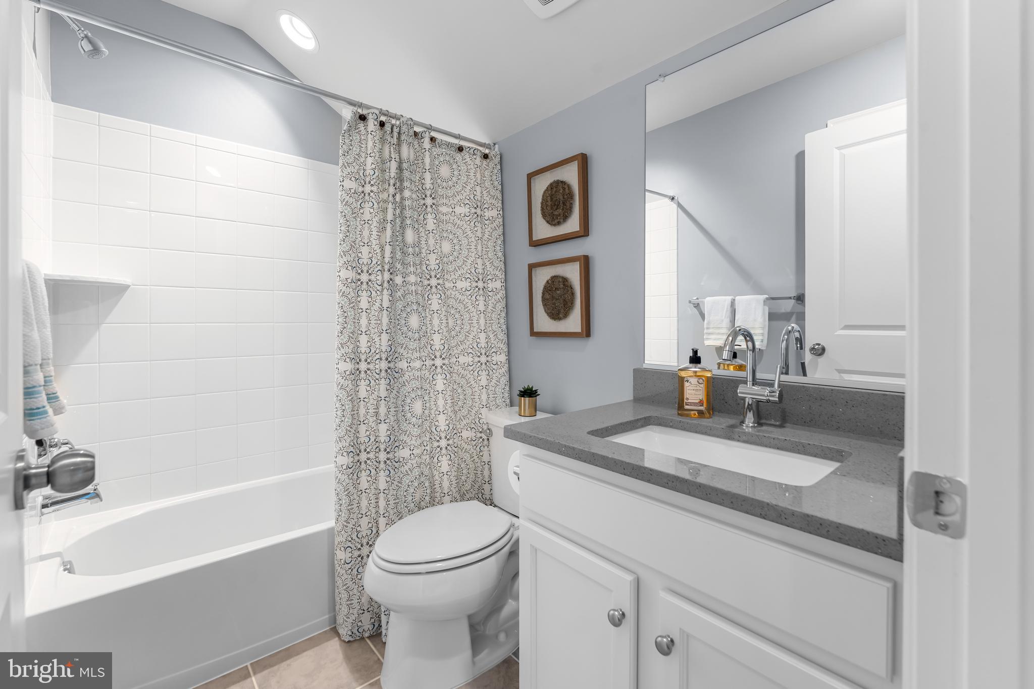 7820 Loblolly Way Hanover, MD 21076 - Photo 42 of 75 a bathroom with a granite countertop sink toilet and shower