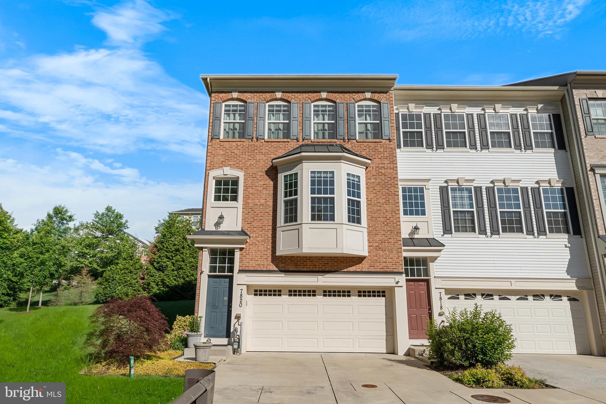 7820 Loblolly Way Hanover, MD 21076 - Photo 50 of 75 a front view of a house with a yard