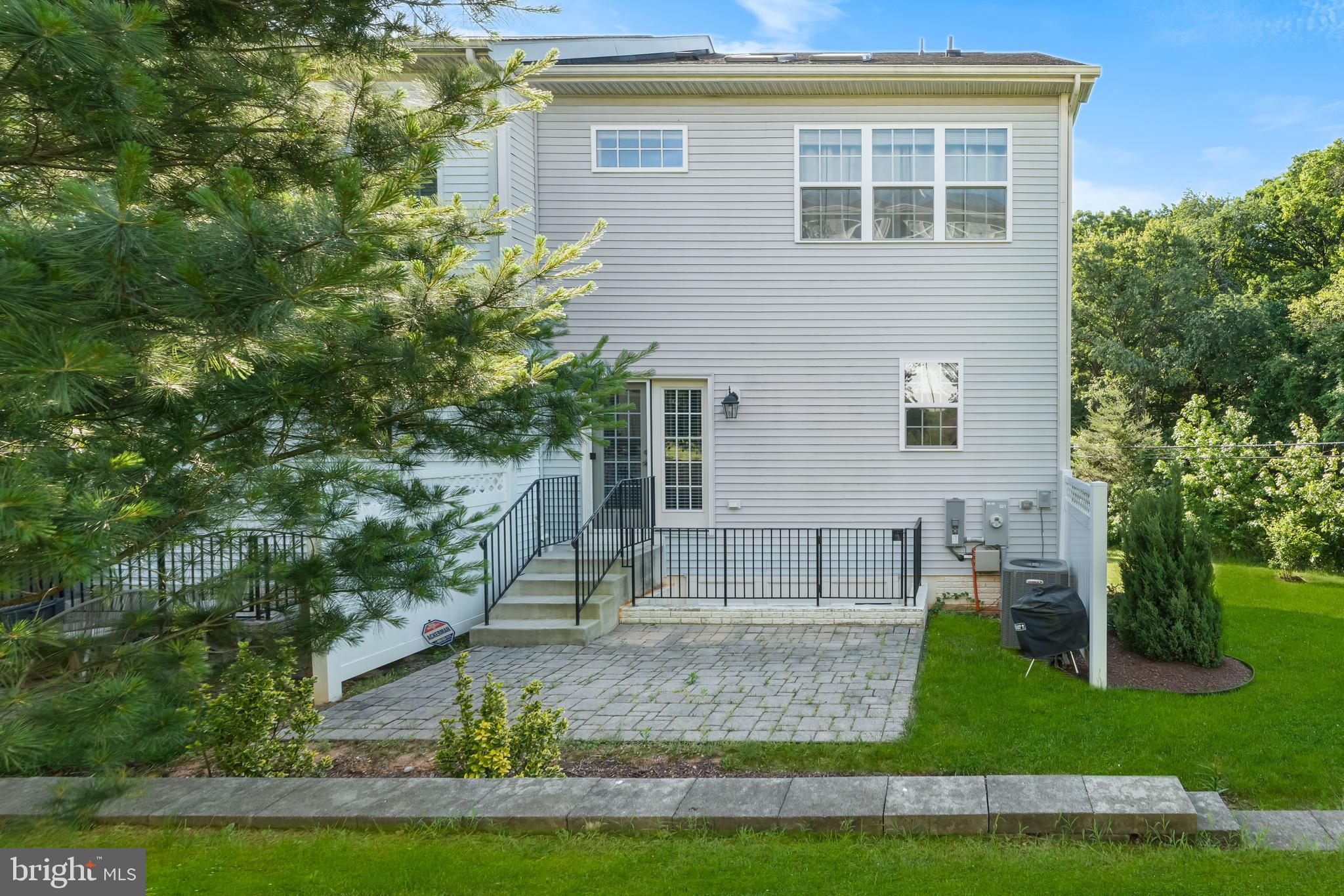 7820 Loblolly Way Hanover, MD 21076 - Photo 56 of 75 a front view of a house with a yard