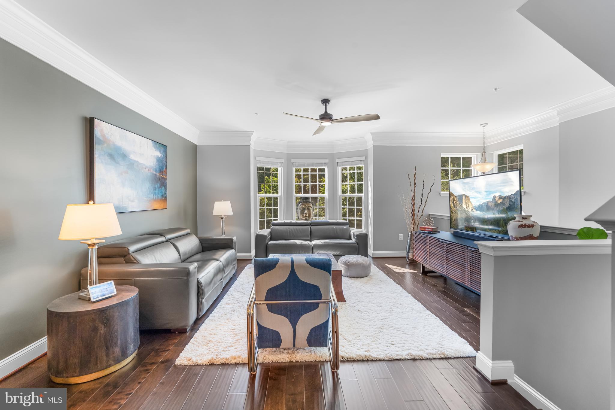 7820 Loblolly Way Hanover, MD 21076 - Photo 8 of 75 a living room with furniture and wooden floor