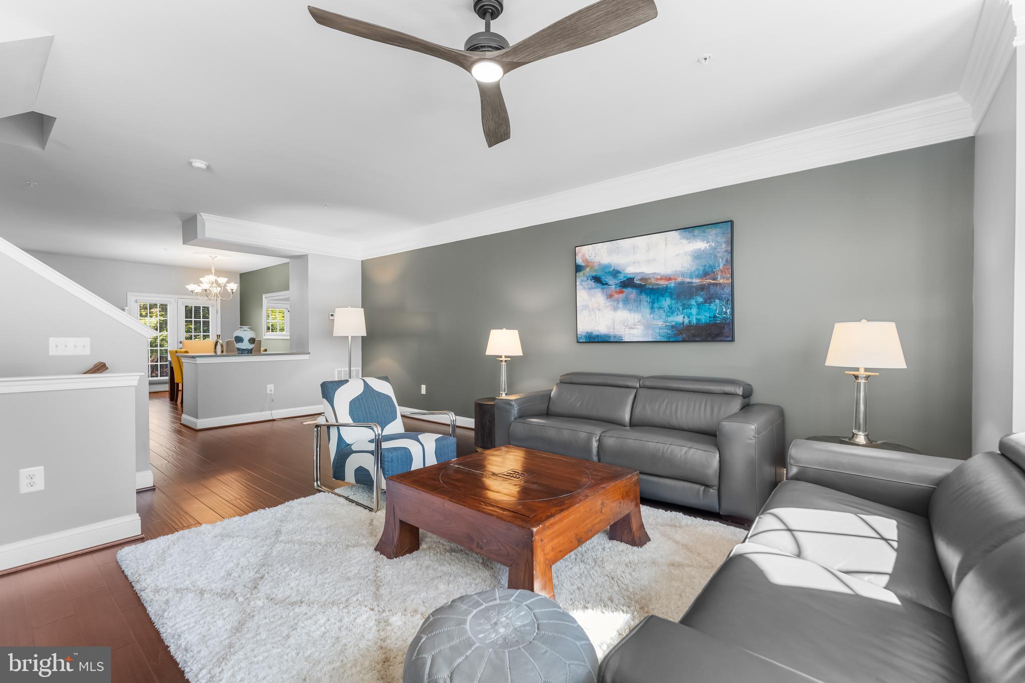 7820 Loblolly Way Hanover, MD 21076 - Photo 9 of 75 a living room with furniture and a table