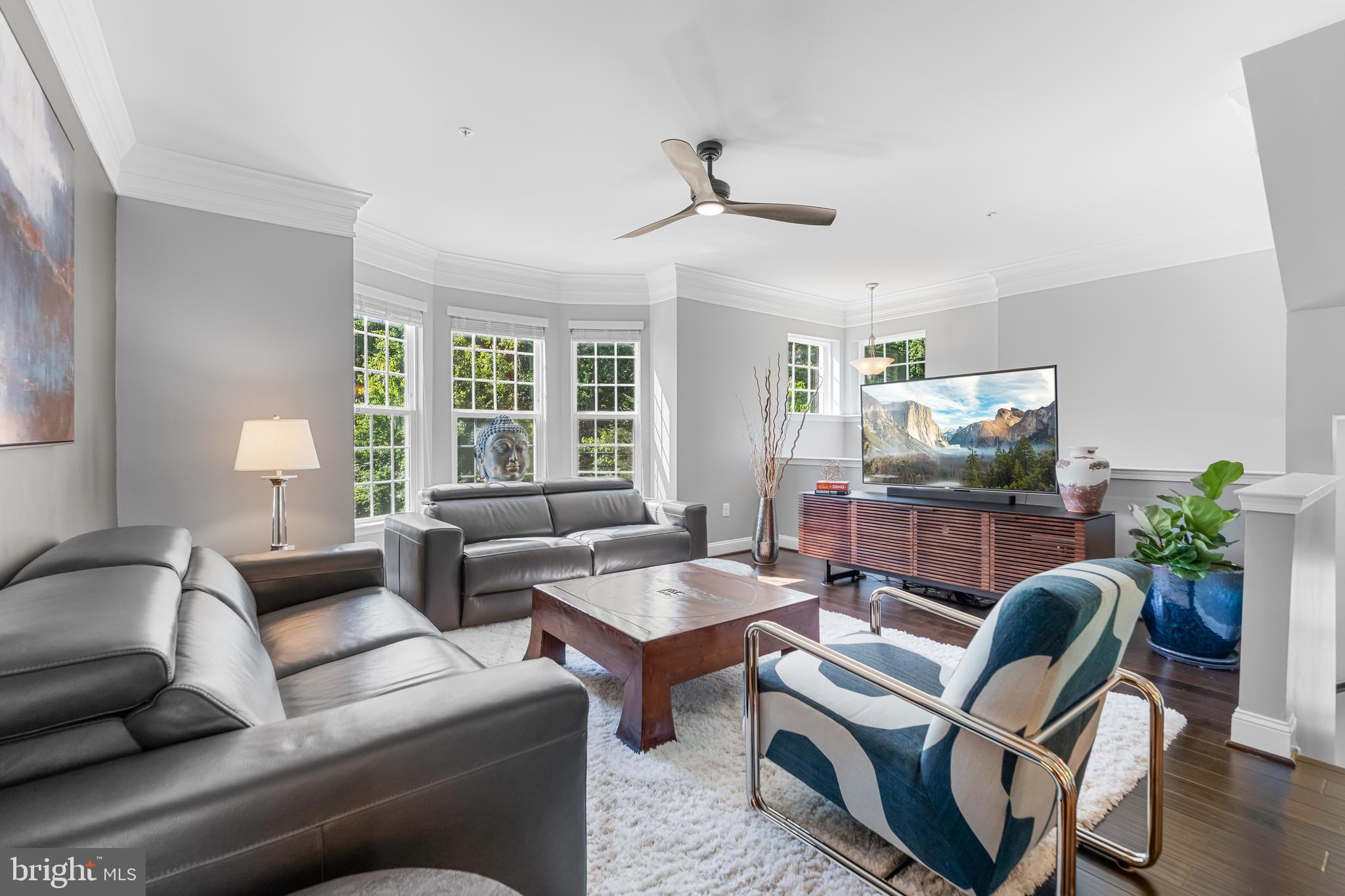 7820 Loblolly Way Hanover, MD 21076 - Photo 10 of 75 a living room with furniture and a large window