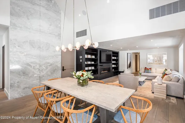 a view of a dining room with furniture
