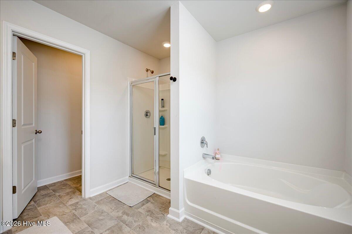 1136 Button Buck Lane Grovetown, GA 30813 - Photo 11 of 17 Primary bathroom garden tub and walk in shower