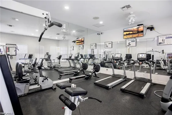 a view of a house with a flower garden