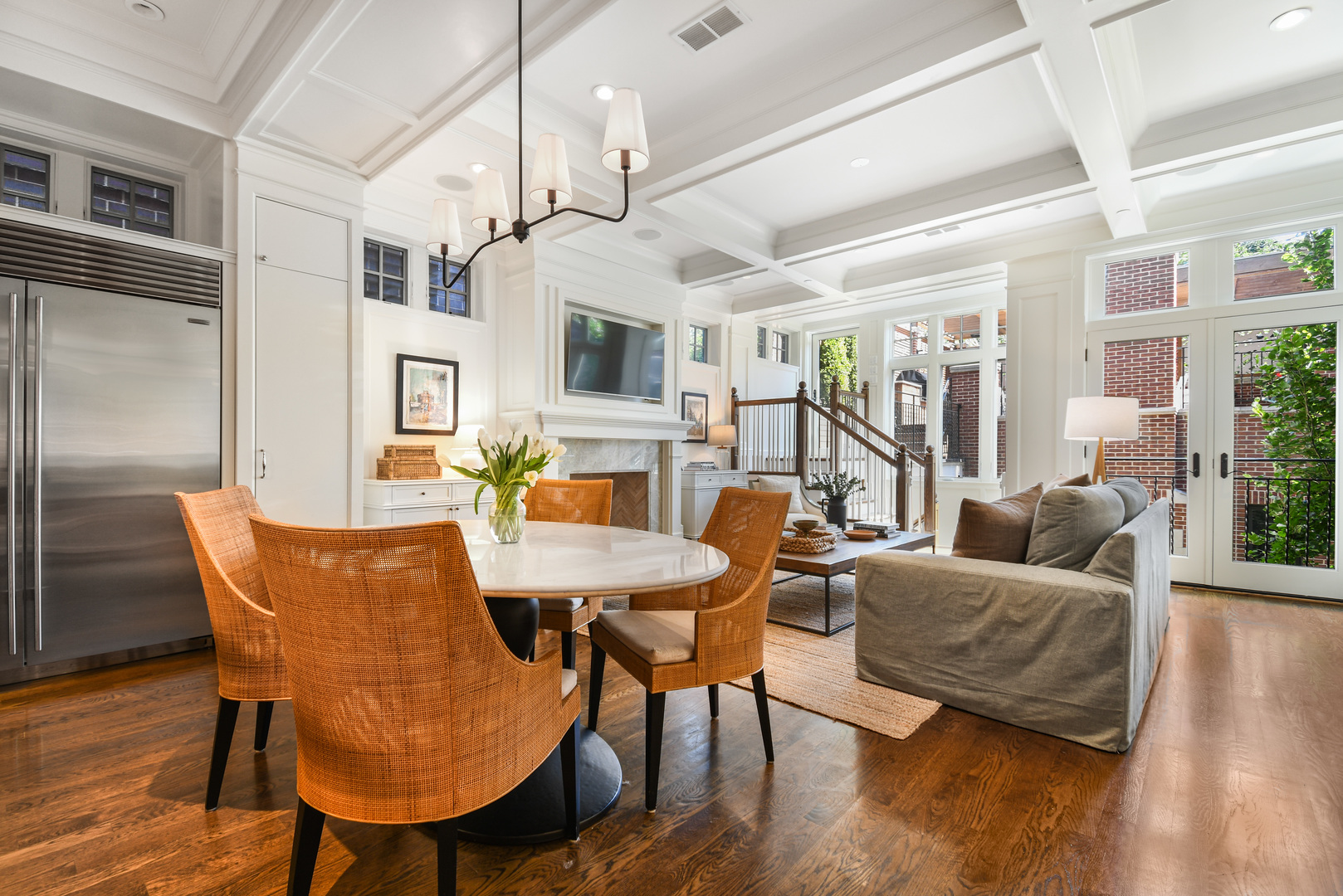 3751 North Greenview Avenue Chicago, IL 60613 - Photo 11 of 52 a living room with furniture a fireplace and a table