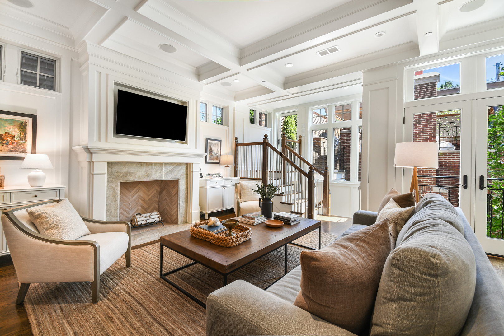 3751 North Greenview Avenue Chicago, IL 60613 - Photo 12 of 52 a living room with furniture a flat screen tv and a fireplace