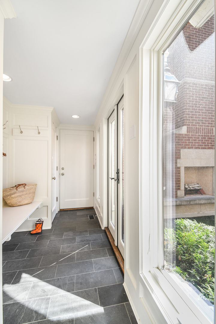 3751 North Greenview Avenue Chicago, IL 60613 - Photo 47 of 52 a view of a bathroom with a sink and a window