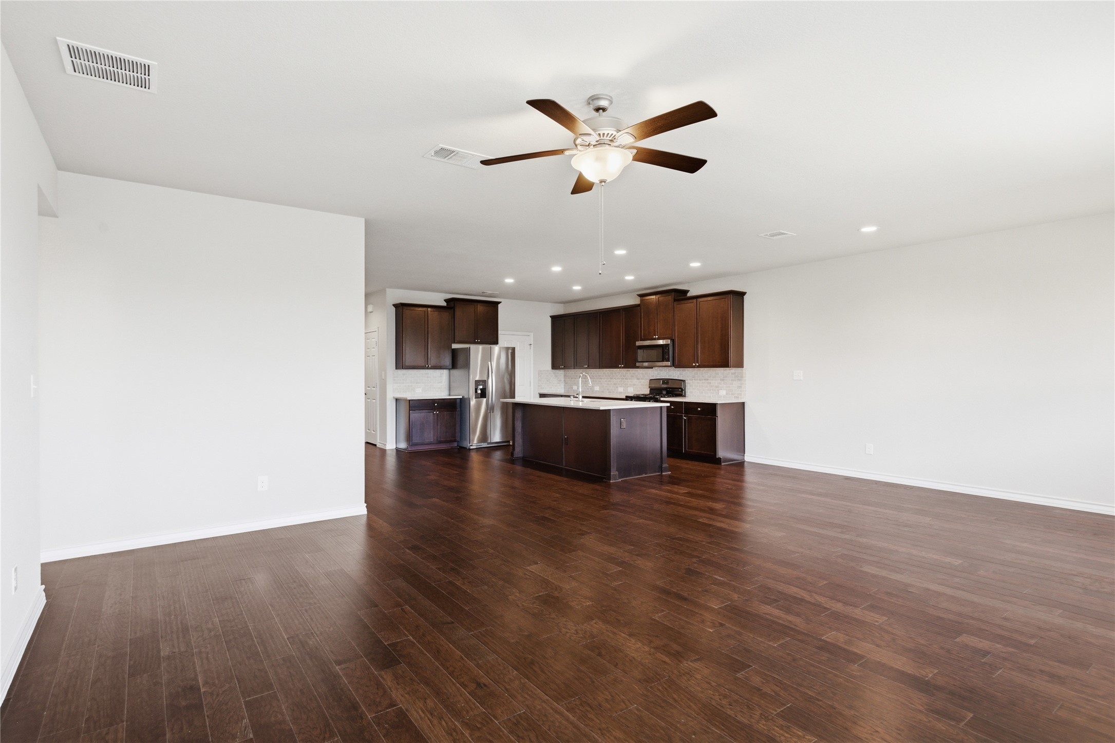 6764 Catania Loop Round Rock, TX 78665 - Photo 33 of 33 a view of kitchen with cabinets and wooden floor