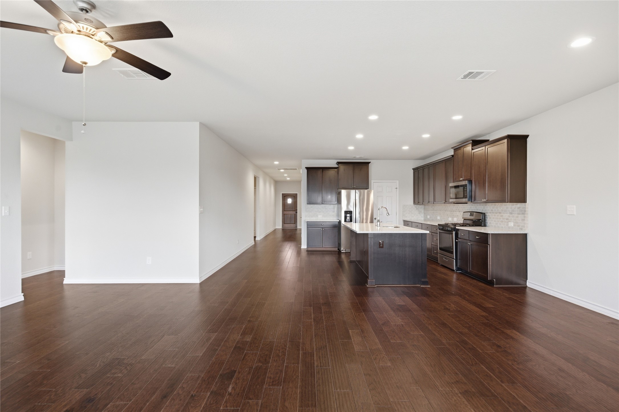 6764 Catania Loop Round Rock, TX 78665 - Photo 19 of 33 a view of kitchen with sink and wooden floor