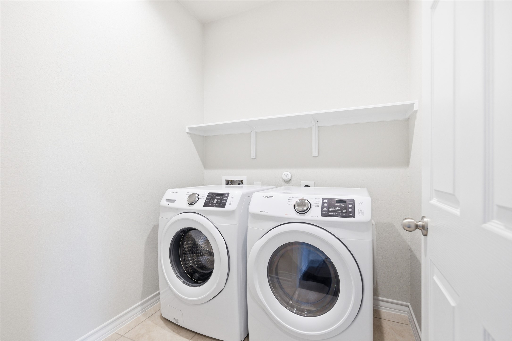 6764 Catania Loop Round Rock, TX 78665 - Photo 20 of 33 a utility room with dryer and washer