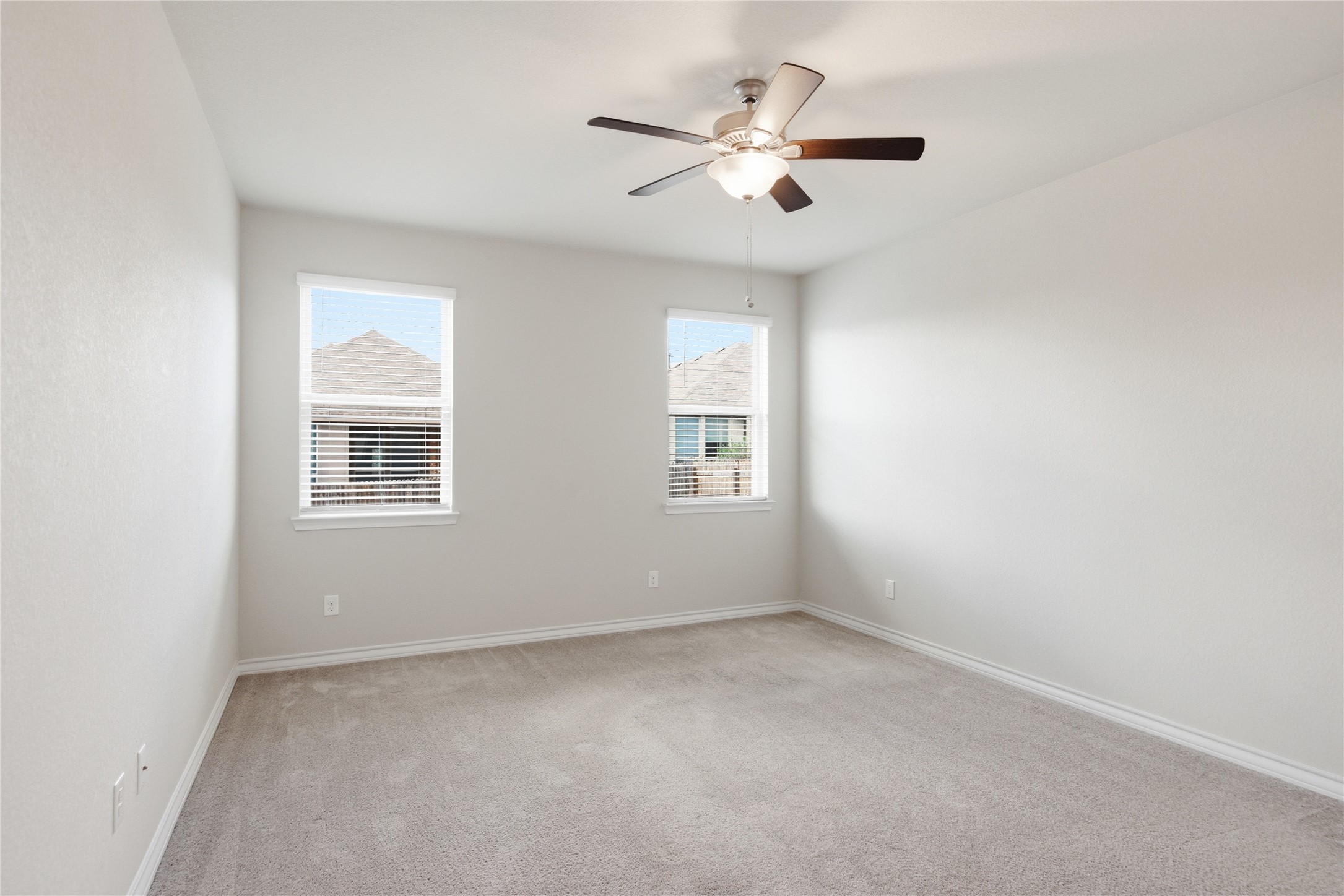 6764 Catania Loop Round Rock, TX 78665 - Photo 21 of 33 an empty room with a window and a fan