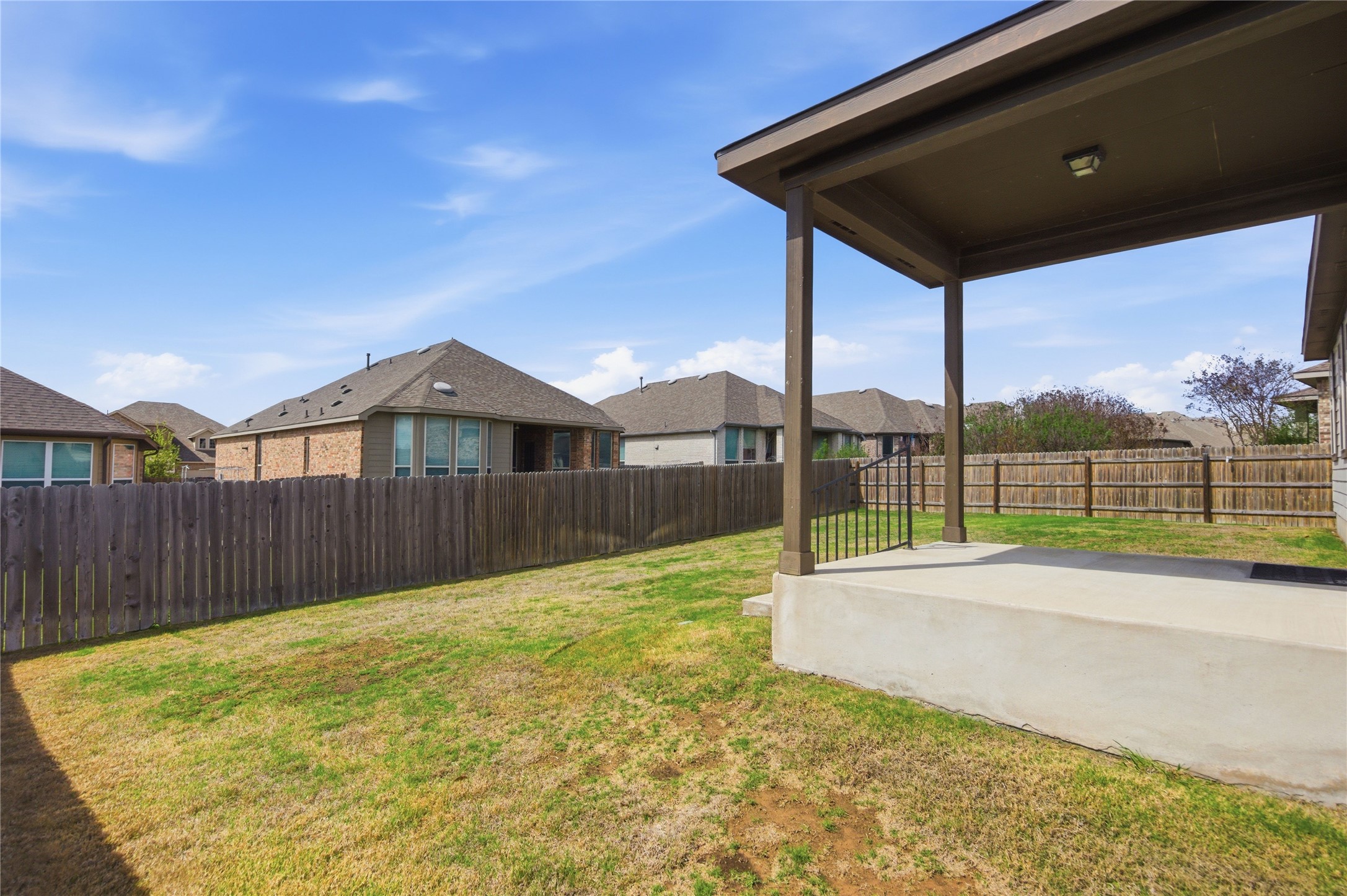 6764 Catania Loop Round Rock, TX 78665 - Photo 26 of 33 a view of backyard with wooden fence