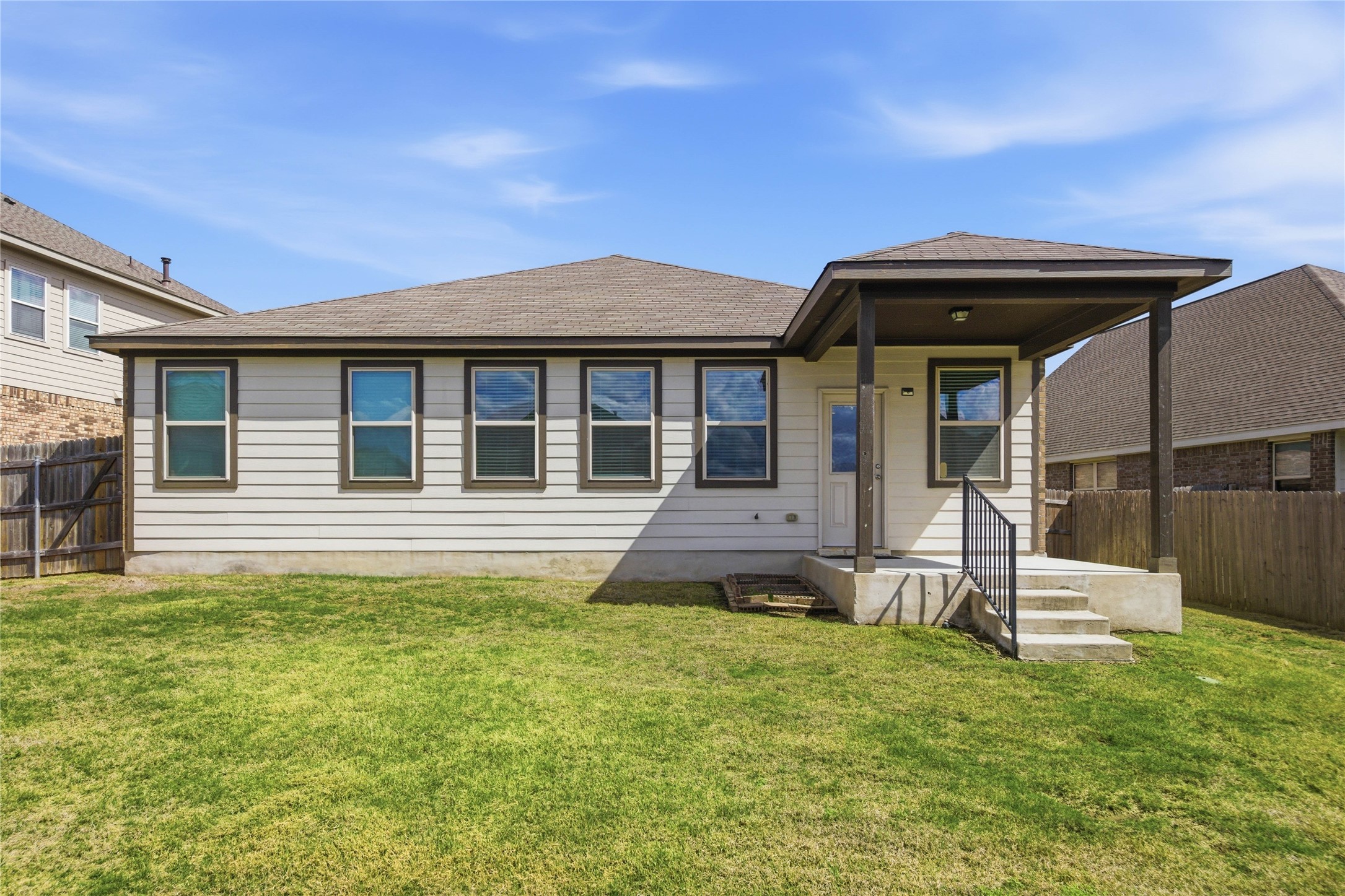 6764 Catania Loop Round Rock, TX 78665 - Photo 28 of 33 a front view of a house with garden