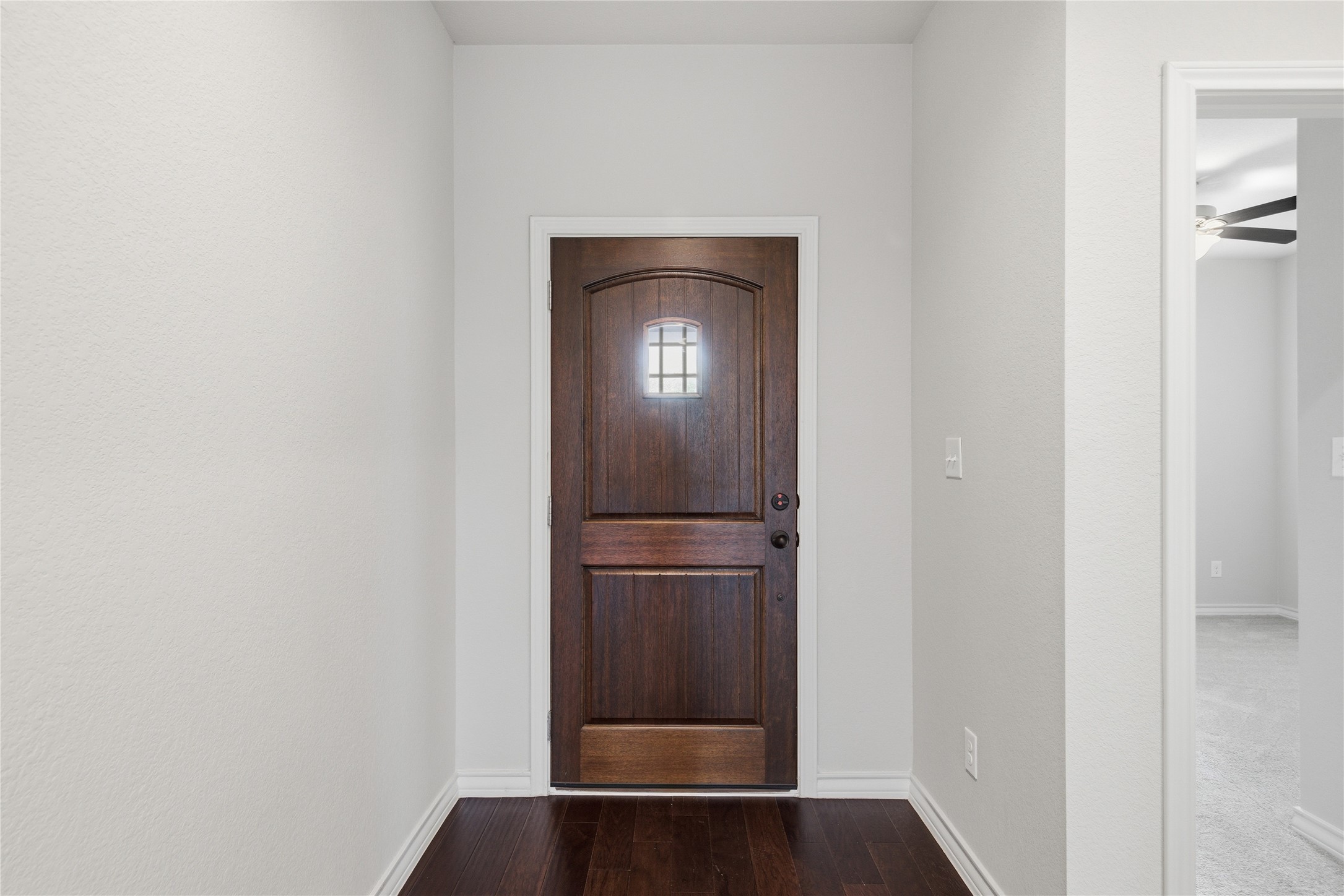 6764 Catania Loop Round Rock, TX 78665 - Photo 5 of 33 a view of a hallway with wooden floor
