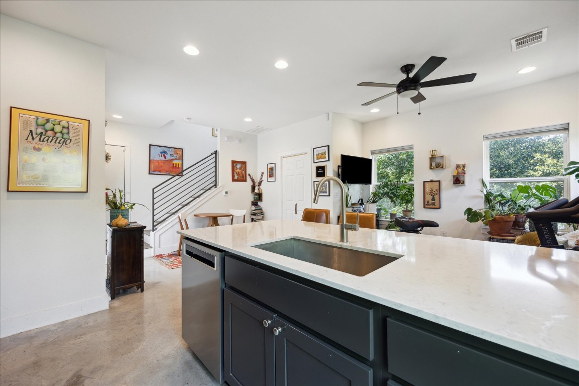a view of a living room and dining room