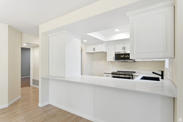 1041 West Grindelwald Court, Unit R5 Midway, UT 84049 - Photo 7 of 44 A clean, functional kitchen layout with generous prep space and seating that naturally connects to the main living area