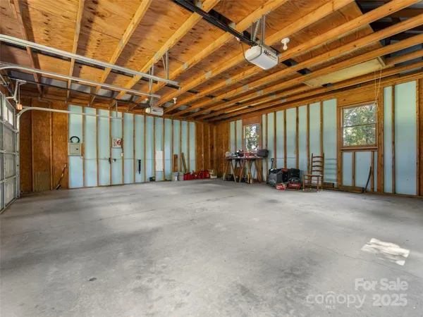 a view of a room with wooden walls