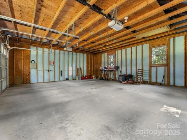 a view of a room with wooden walls