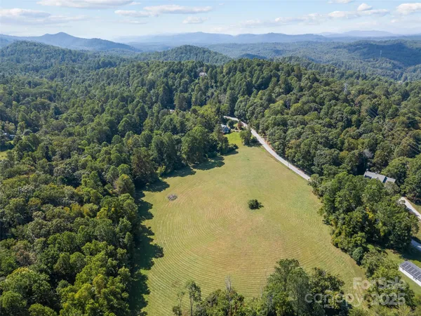 an aerial view of residential house with outdoor space