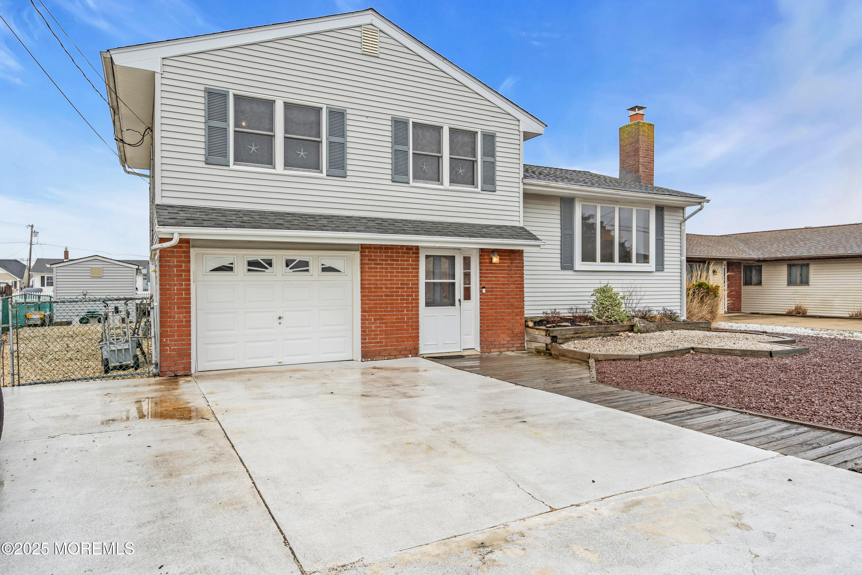220 Montclair Road South Barnegat, NJ 08005 - Photo 3 of 48 a front view of a house with a yard