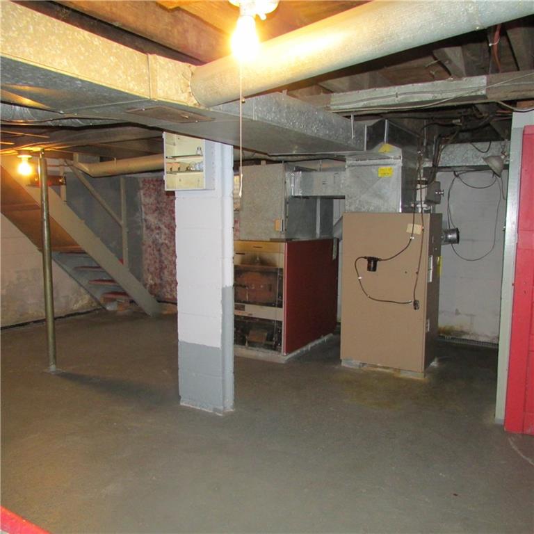 101 Century Farm Road Clinton, PA 15026 - Photo 23 of 24 Basement oil furnace, coal/woodburner tied into the furnace.