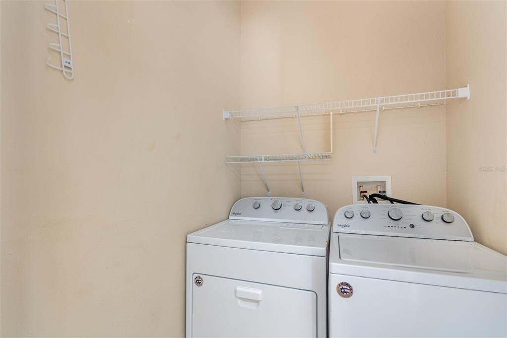 6686 South Goldenrod Road, Unit 139A Orlando, FL 32822 - Photo 13 of 23 a utility room with dryer and washer