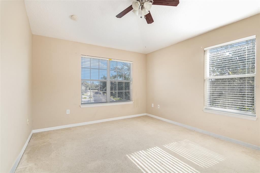 6686 South Goldenrod Road, Unit 139A Orlando, FL 32822 - Photo 17 of 23 a view of an empty room with a window