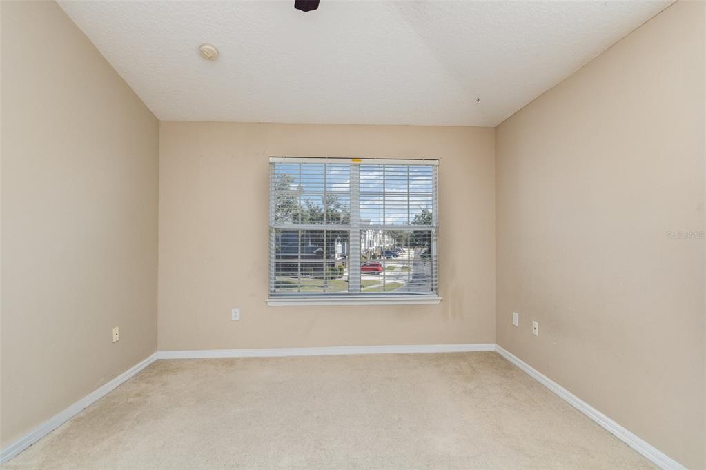 6686 South Goldenrod Road, Unit 139A Orlando, FL 32822 - Photo 21 of 23 an empty room with a window