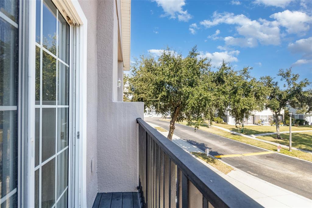 6686 South Goldenrod Road, Unit 139A Orlando, FL 32822 - Photo 23 of 23 a view of a balcony from a door