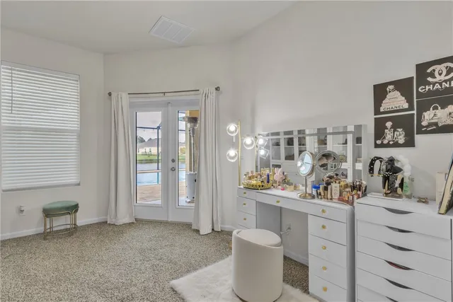 a room with cabinets and window