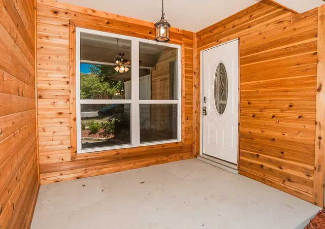 a front view of a house with a porch