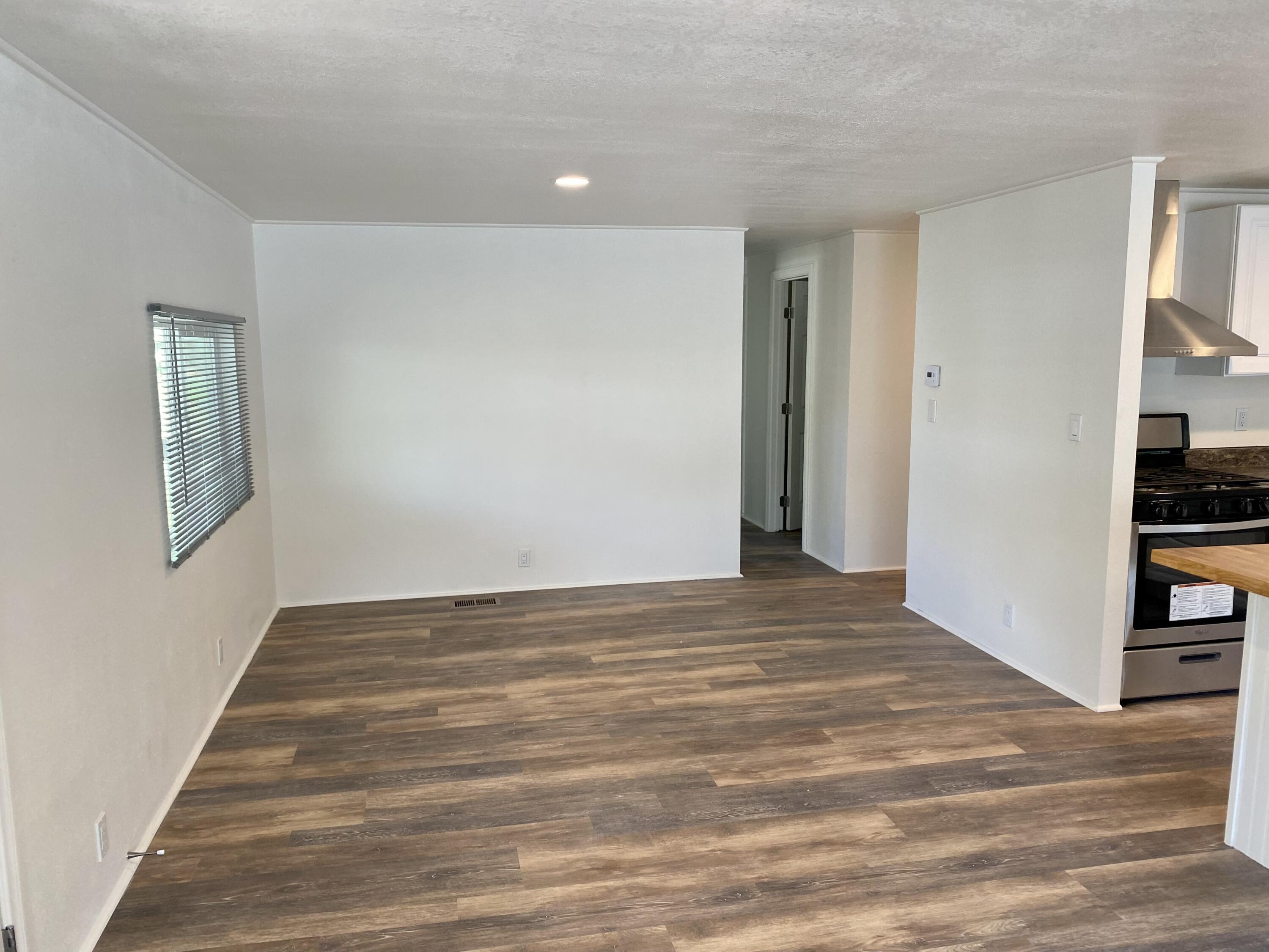 6480 Katherine Road, Unit 6 Simi Valley, CA 93063 - Photo 7 of 13 a view of an empty room with closet and a window