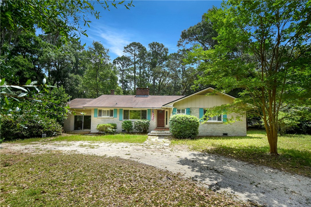 106 Dodge Road St. Simons Island, GA 31522 - Photo 1 of 24 Front of home