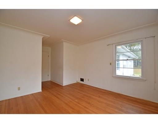 130 Davis Road Westminster, MA 01473 - Photo 14 of 19 a view of an empty room with wooden floor and a window