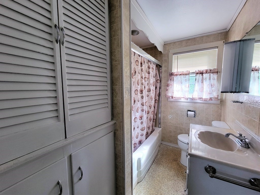 52 Ella Street Athol, MA 01331 - Photo 15 of 23 a bathroom with a sink and a mirror