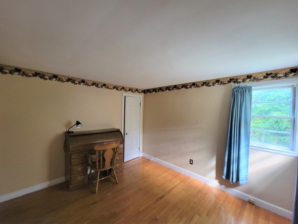 52 Ella Street Athol, MA 01331 - Photo 19 of 23 a room that has a bed and a chair