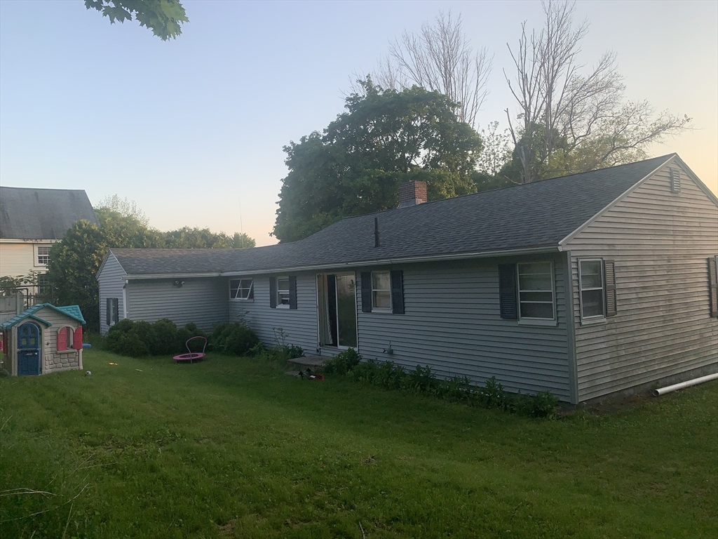 52 Ella Street Athol, MA 01331 - Photo 4 of 23 a view of a backyard with plants and large tree